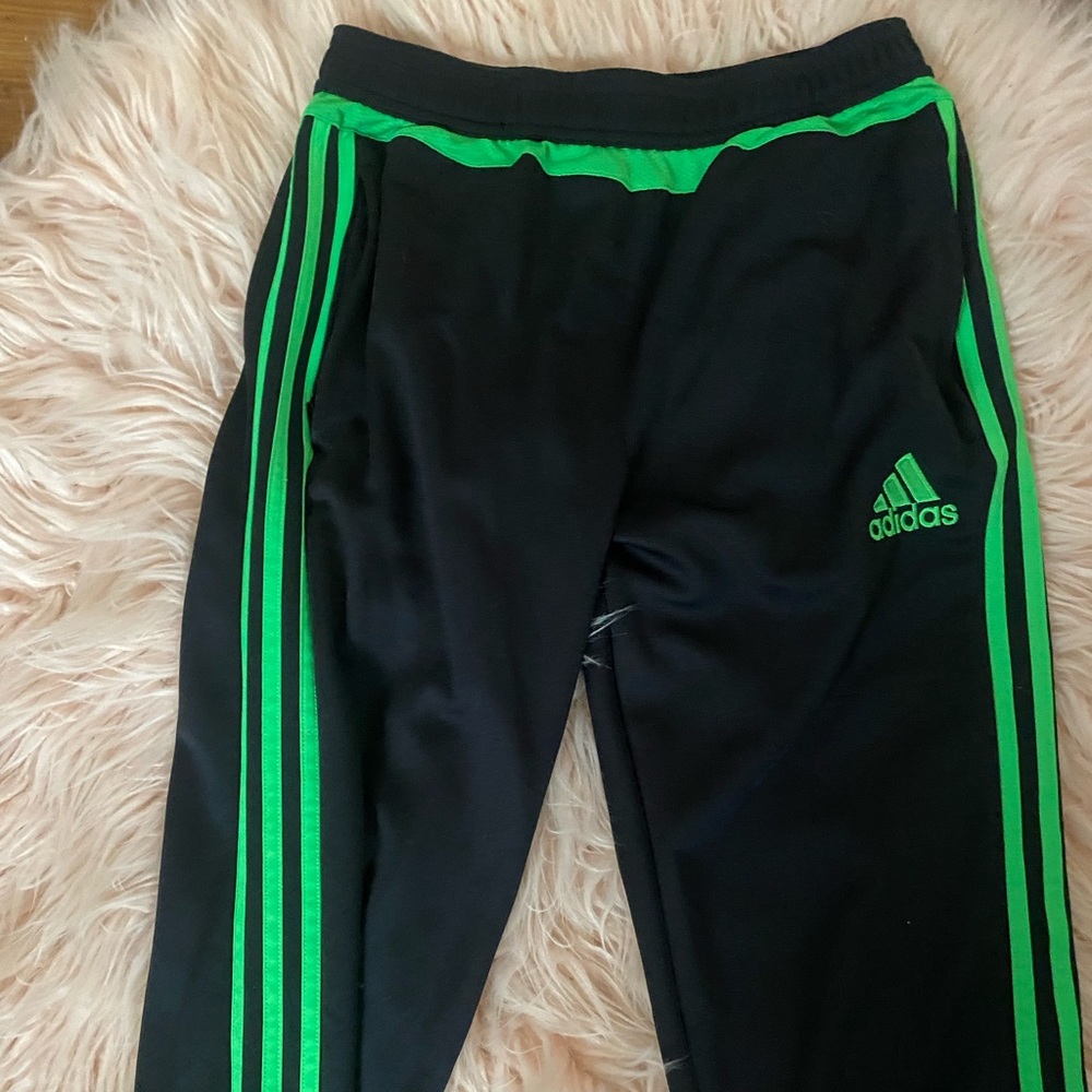 Black and green adidas striped pants